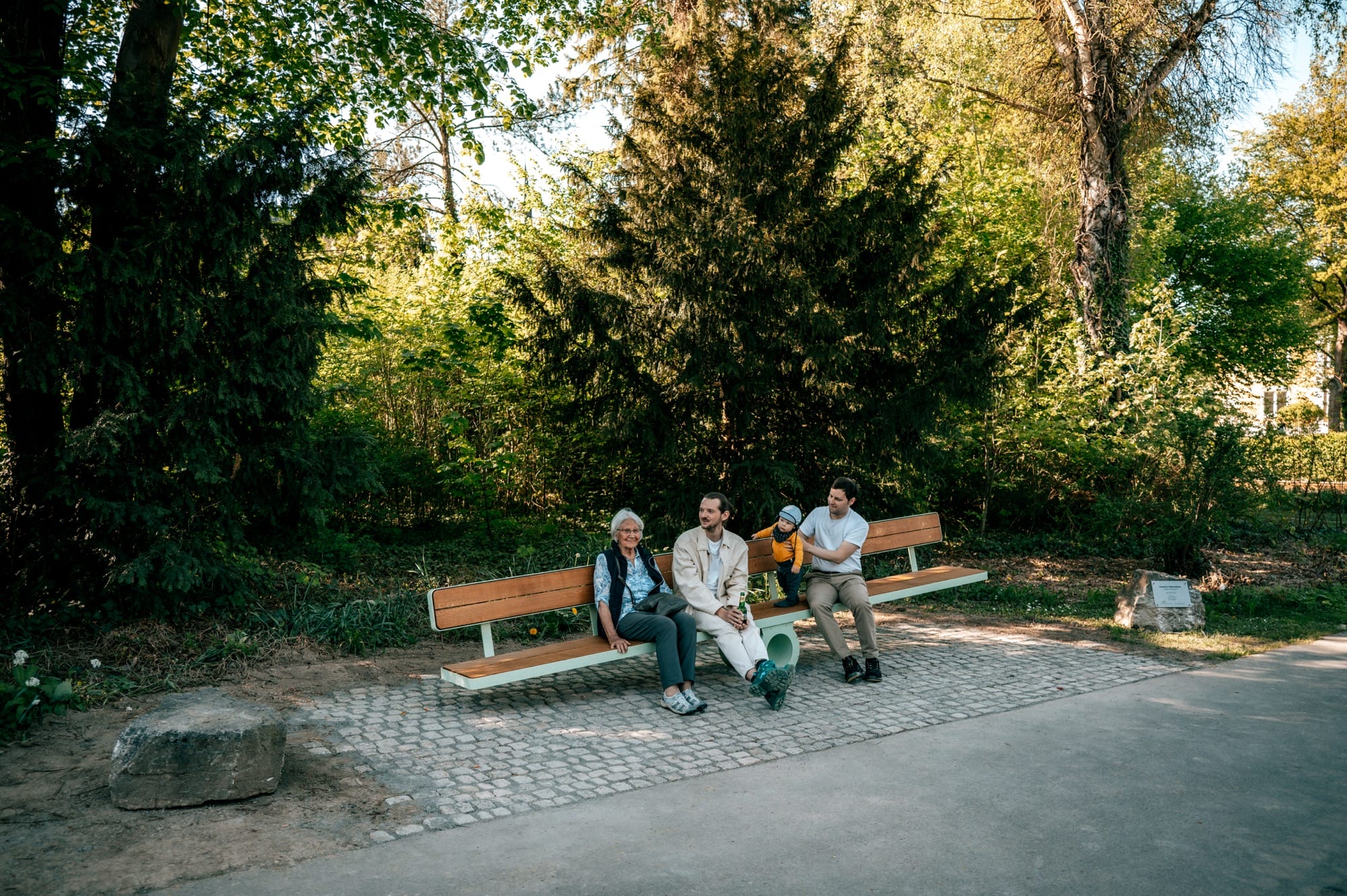 a bench shifts to the left as people balance on either side