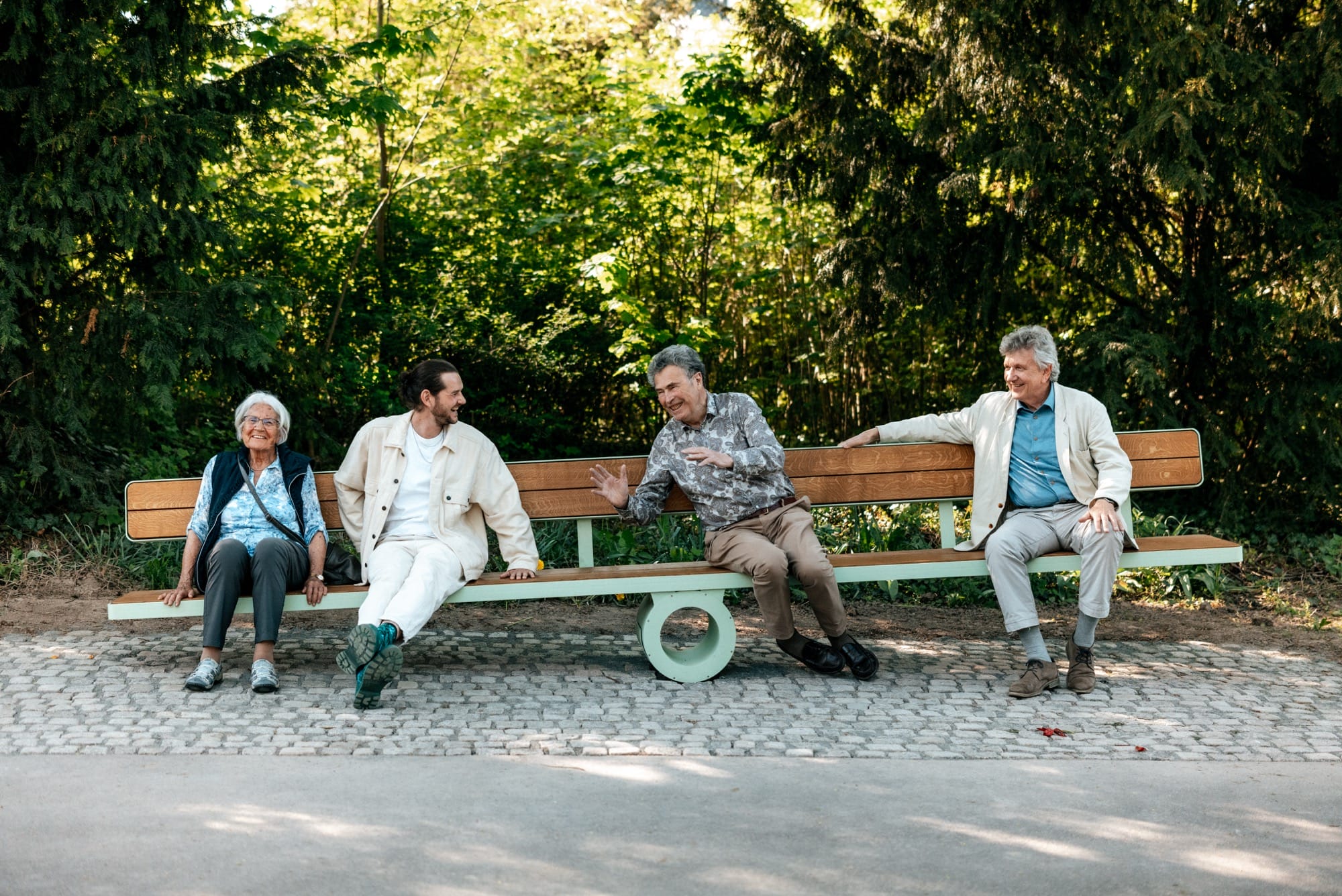 a bench shifts to the left as people balance on either side