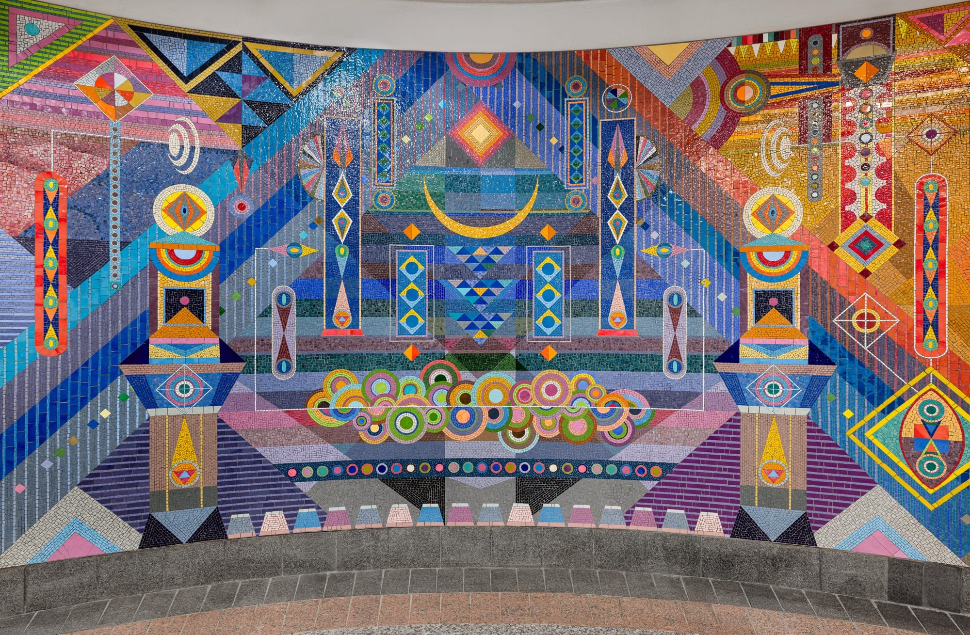 detail of a vibrant geometric mural made of mosaic