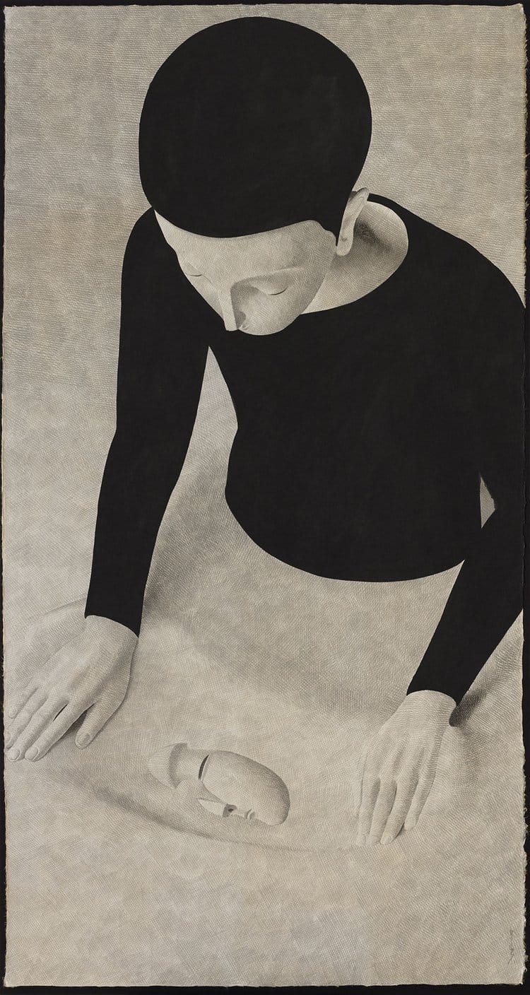 an ink drawing on paper of a figure wearing black clothing, halfway in sand and revealing the outline of a face in the sand
