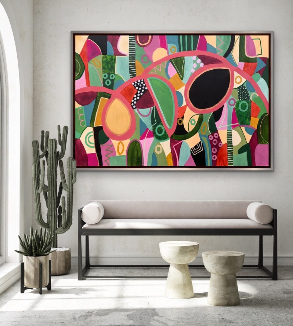 Room with a big, abstract painting make of organic, leaf-like shapes in shades of green and red.