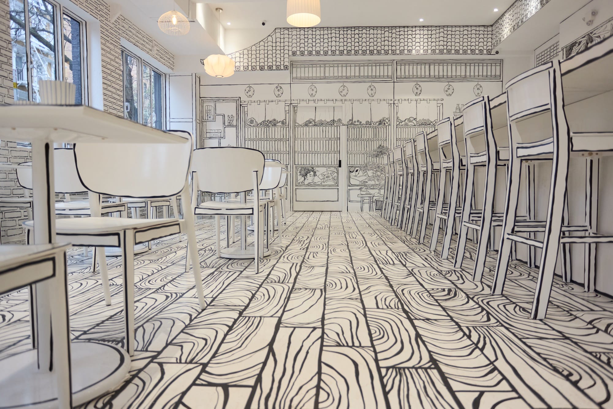 This Lower Manhattan Restaurant Doubles as an Immersive Black-and-White Sketchbook