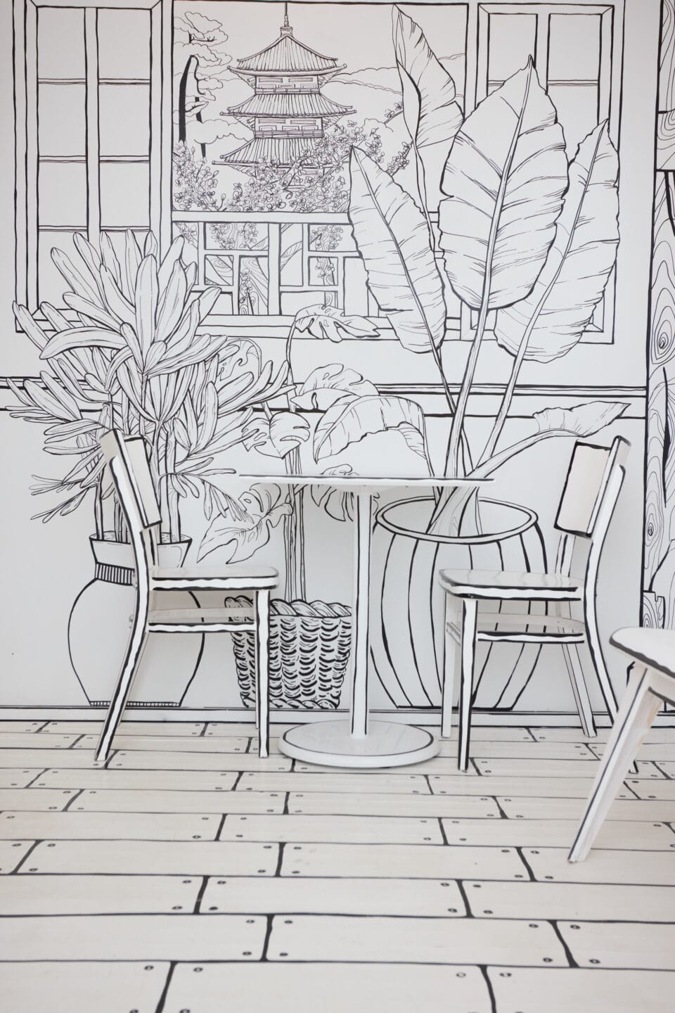 a restaurant all in black-and-white with line-drawn details on every surface so that it appears like a living 2D drawing