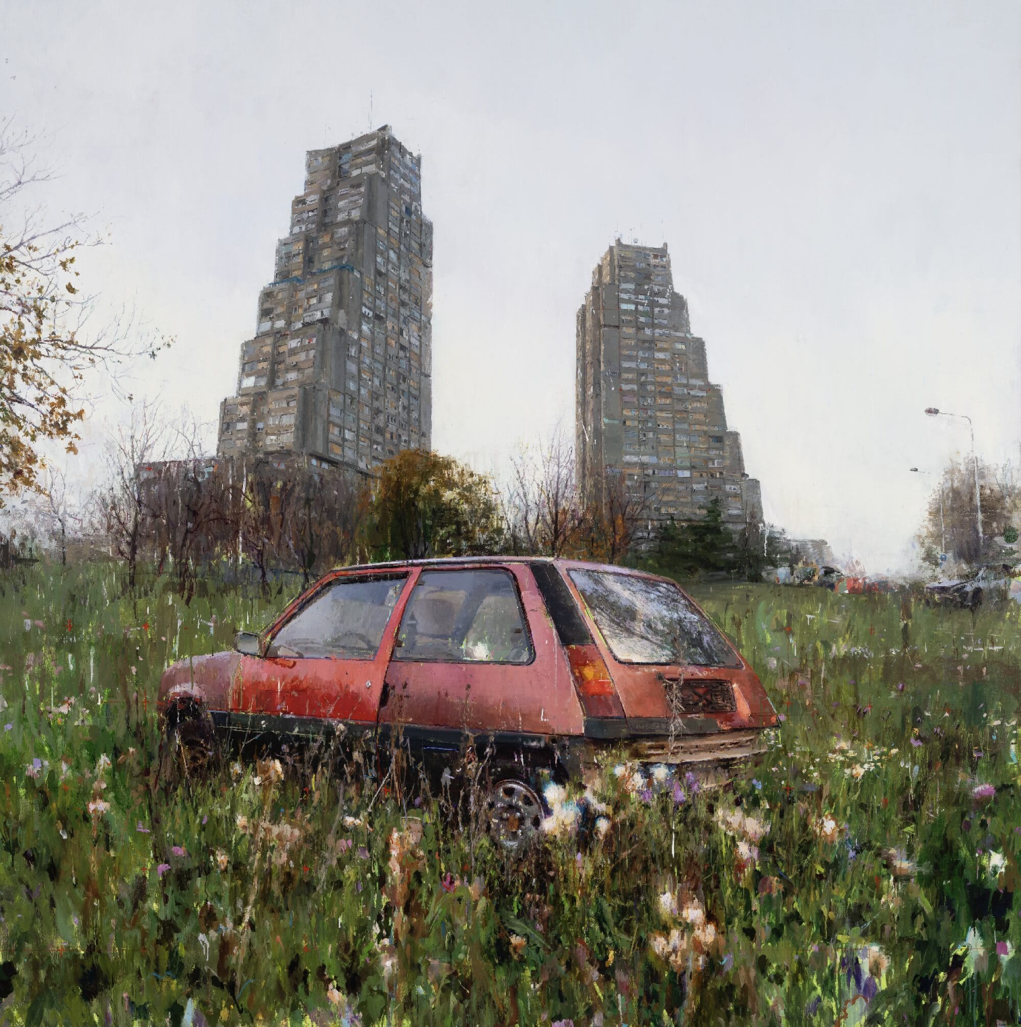 an oil painting of an old red car in a grassy meadow with two large brutalist high-rise buildings in the background